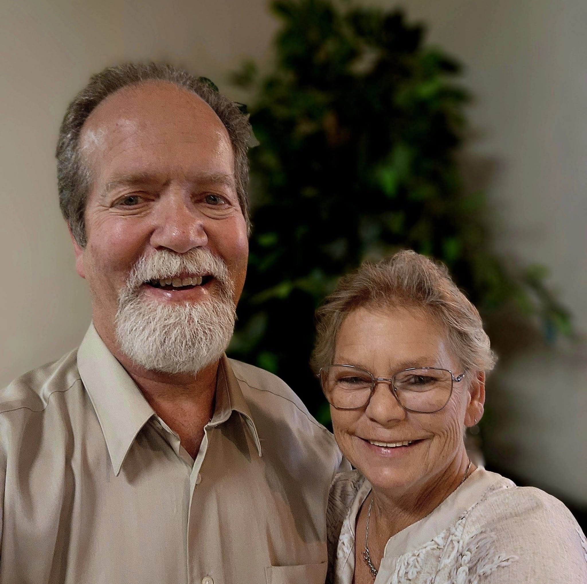 A smiling couple standing together